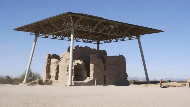 eathern building under modern roof structure