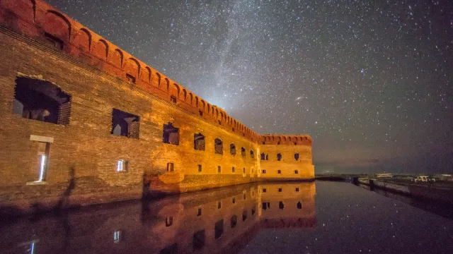 A few of the stars at night with a view of Fort Jefferson.