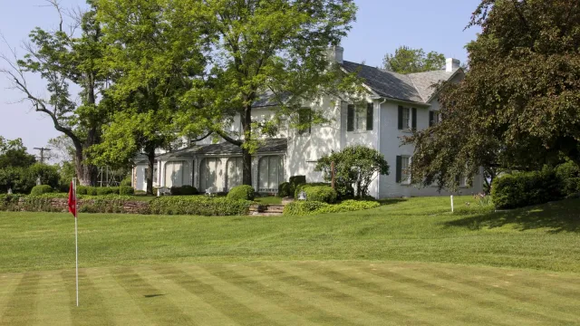 The Eisenhower home with Ike's putting green in the foreground