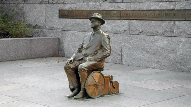 Picture of FDR in a wheel chair within his memorial