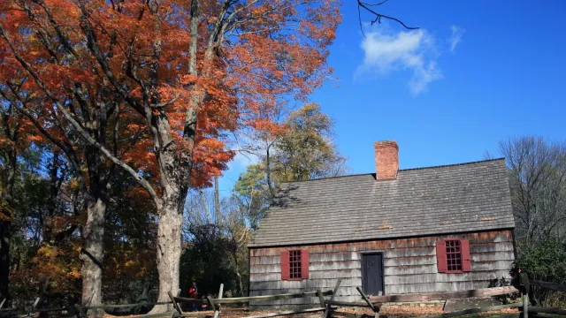 The Wick House surrounded by colorful fall leaves