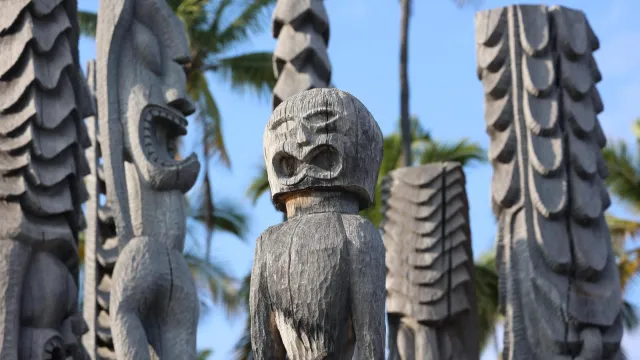 Carved wooden kiʻi
